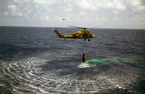 Ocean rescue, as a helicopter lifts NASA astronaut Alan Shepard from ...