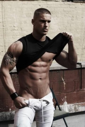 Hot Guy In Football Pants Lifting Shirt To Show 6 Pack Abs