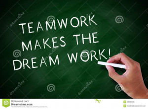 Hand writing Teamwork Makes The Dream Work with white chalk on a ...