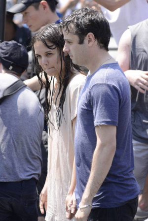 Katie Holmes Strips Down