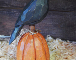 Hand Carved Crow on Carved Pumpkin.