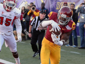 PHOTO: Josh Shaw of the USC Trojans intercepts a pass in the end zone ...