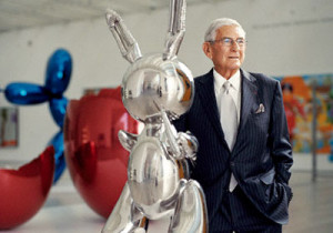 Eli Broad with a Jeff Koons sculpture...