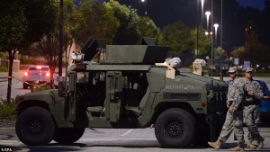 The Missouri National guard patrols a policemand center on West