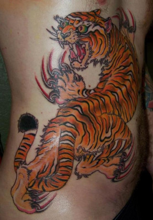 Tiger tattoos-l_c4421da4bf2d4e568872bf45726c1196.jpg