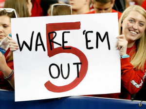 Louisville Cardinals fans hold up a sign for injured player Kevin Ware ...