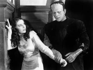 Frankenstein's Monster (Boris Karloff) menaces Frankeinstein's Bride ...