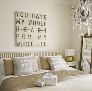 love the quote sign over the bed