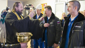 Final pre-launch preparations, including a Orthodox priest’s ...