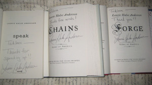 ... nice hardcover copies of Chains and Forge , plus my copy of Speak