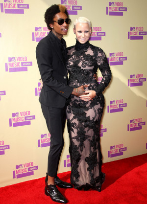 Rapper Wiz Khalifa and model Amber Rose arrive at the 2012 MTV Video ...
