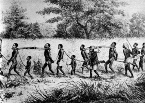An African dealer marches Slaves to the coast where they will be sold.