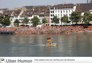 Dutch fans are watching a game against Germany on a big screen over ...