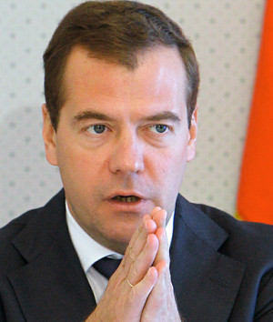 Russian President Dmitry Medvedev gestures as he speak during a ...