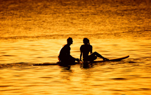 surf-couple-sunset-photo