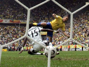 Brazil's Ronaldo (right) scores past Ghana's defender John Pantsil in ...
