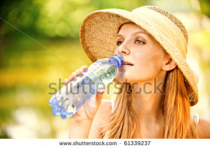 Young Beautiful Girl Straw...