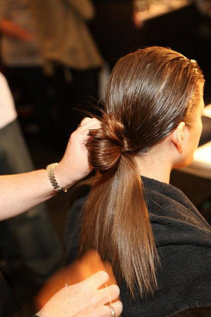 Step 1: Dampen hair with water and brush through.