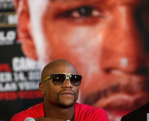 Photos: Mayweather, Canelo Go Face To Face in Houston