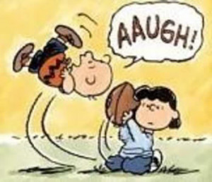 Charlie Brown falls for the football gag again.