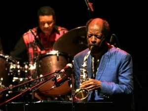 Jazz musician Ornette Coleman (R) of the U.S. plays his saxophone in ...