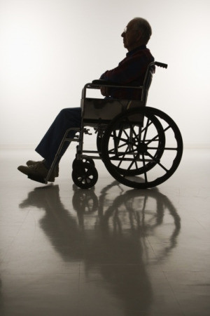 Silhouetted_elderly_man_in_wheelchair300px.jpg