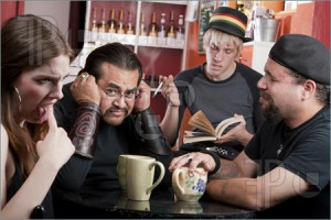 Three friends listening to bad male poet with smoky cigarette in a ...