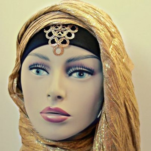 by the society’s actions or by direct control to wear hijab, scarf ...