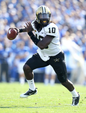 Larry Smith Larry Smith 10 of the Vanderbilt Commodores runs with the