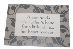 son holds his mother's hand for a little while... her heart forever.
