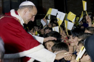 File photo of Pope Paul VI greeting children during Rome parish visit ...