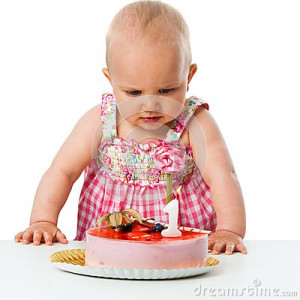 Portrait of cute baby girl celebrating first birthday with cake ...