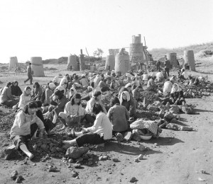 group of people resting after work on a commune