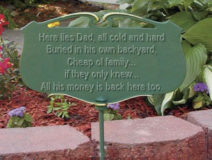 tombstone in a creepy cemetery with a funny epitaph Here lies Dad ...