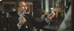 Hans Gruber (Alan Rickman being awesome) is removing the silencer from ...