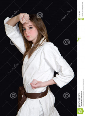 karate girl on black background.