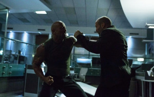The Rock stars as Luke Hobbs and Jason Statham stars as Deckard Shaw ...