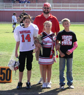 At pee-wee homecoming I got to escort sissy onto the field.