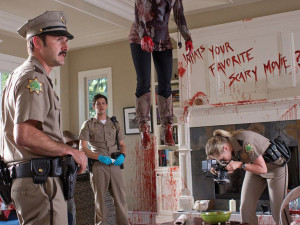 David Arquette checks out a crime scene in SCREAM 4 | ©2011 The ...