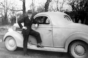 Vern as a missionary, with his first car.