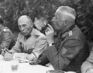 Field Marshal Erich Von Manstein enjoys a cigar after a meal (?) in ...