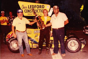 Jimmy Haynes with Charlie Ledford and Harry Campbell after a Sprint