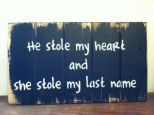 Sign: He stole my heart, she stole my last name. $21.00, via Etsy.