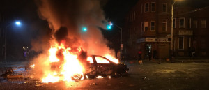 Car burning in Baltimore riots (Source: Casey Harper)