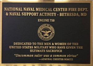 The dedication plaque proudly displayed above our pump panel