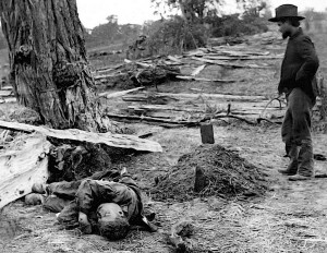 Union soldier is buried while Confederate lies unburied photo - John ...