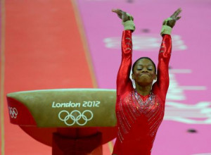 ... woman to win individual all-around gold and team gold at the Olympics