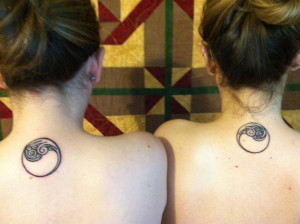 Twin sister tattoos