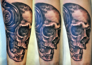 Skull with turbo tattoo by gettattoo