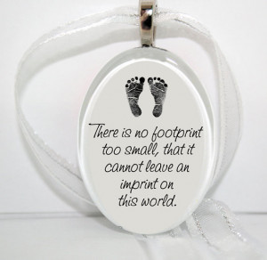 No footprint too small... Oval Glass Christmas Ornament
